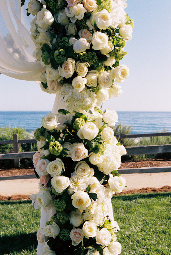wedding ceremony floral decor photo by Yvette Roman Photography
